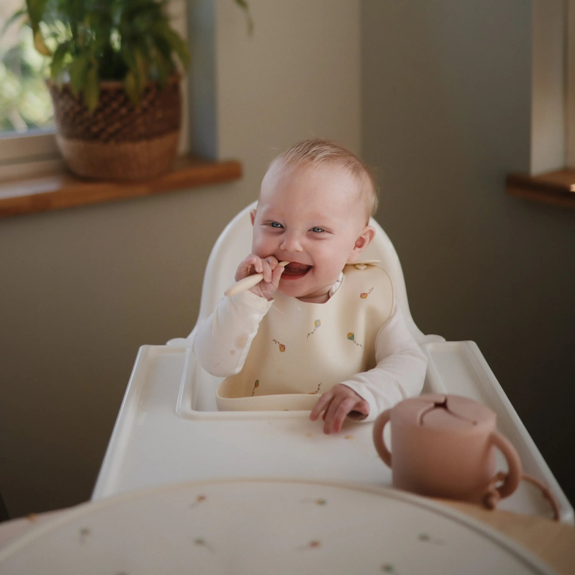 Silicone Baby Bib with Adjustable Neck Strap and Front Pocket for Easy Cleaning Mushie Everetts Place: Online Boutique