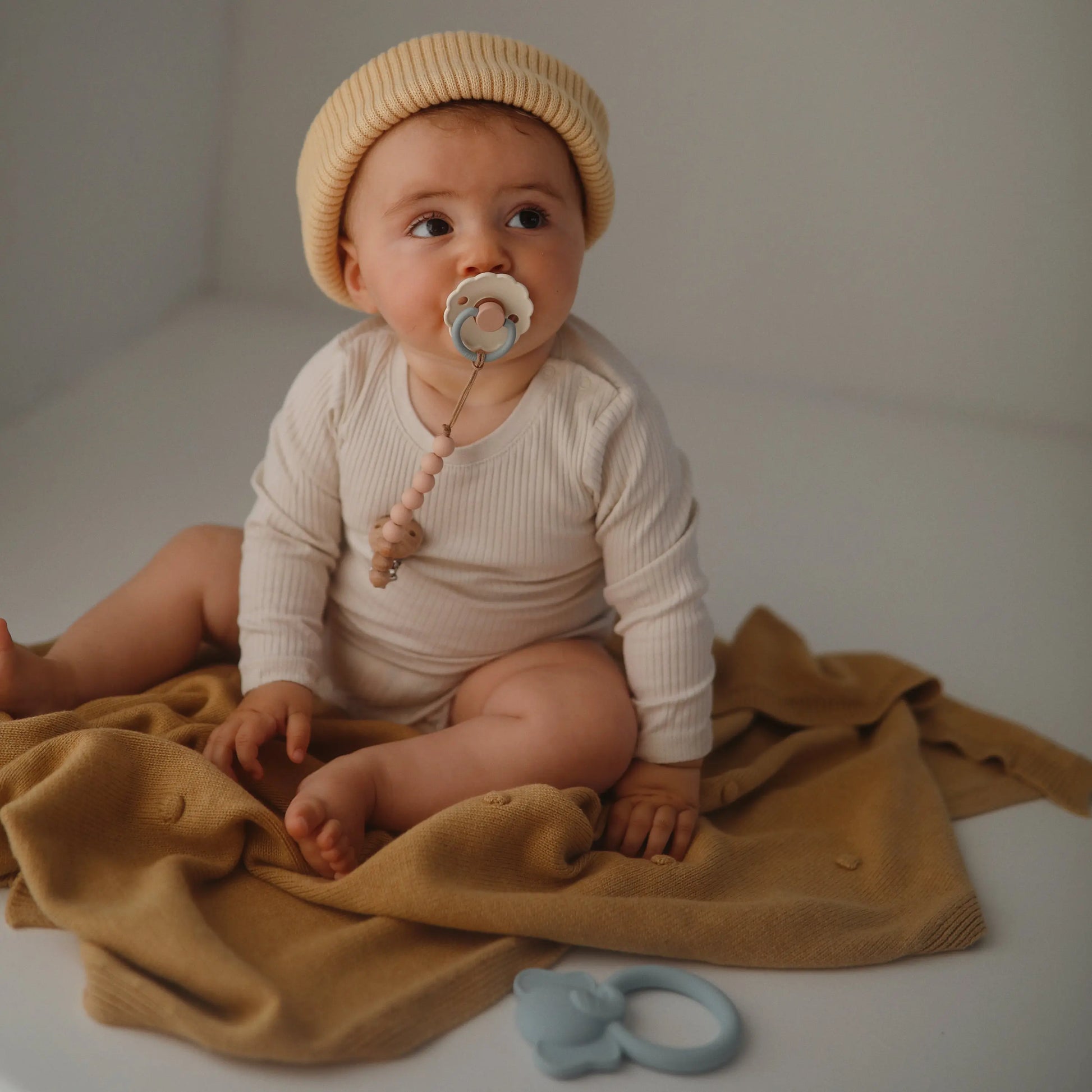 Silicone Pacifier Clip Eva with Faux Wood Clasp and Colorful Beads Mushie Everetts Place: Online Boutique
