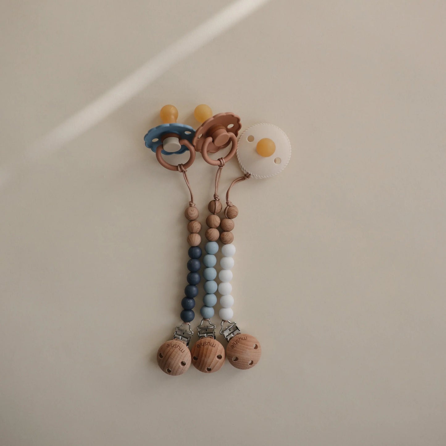 Silicone Pacifier Clip Eva with Faux Wood Clasp and Colorful Beads Mushie Everetts Place: Online Boutique