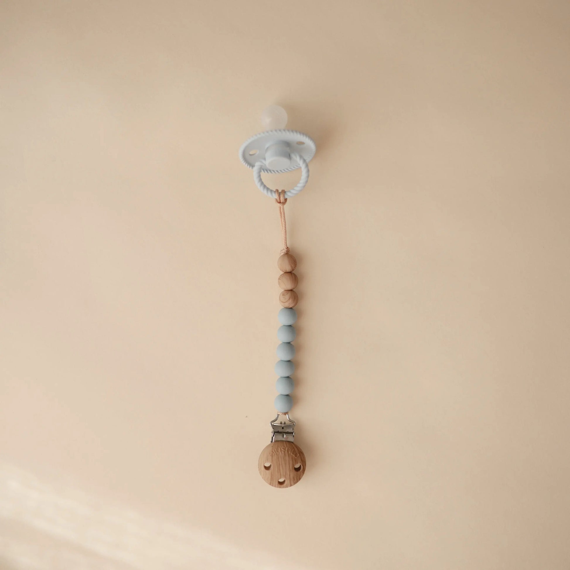 Silicone Pacifier Clip Eva with Faux Wood Clasp and Colorful Beads Mushie Everetts Place: Online Boutique