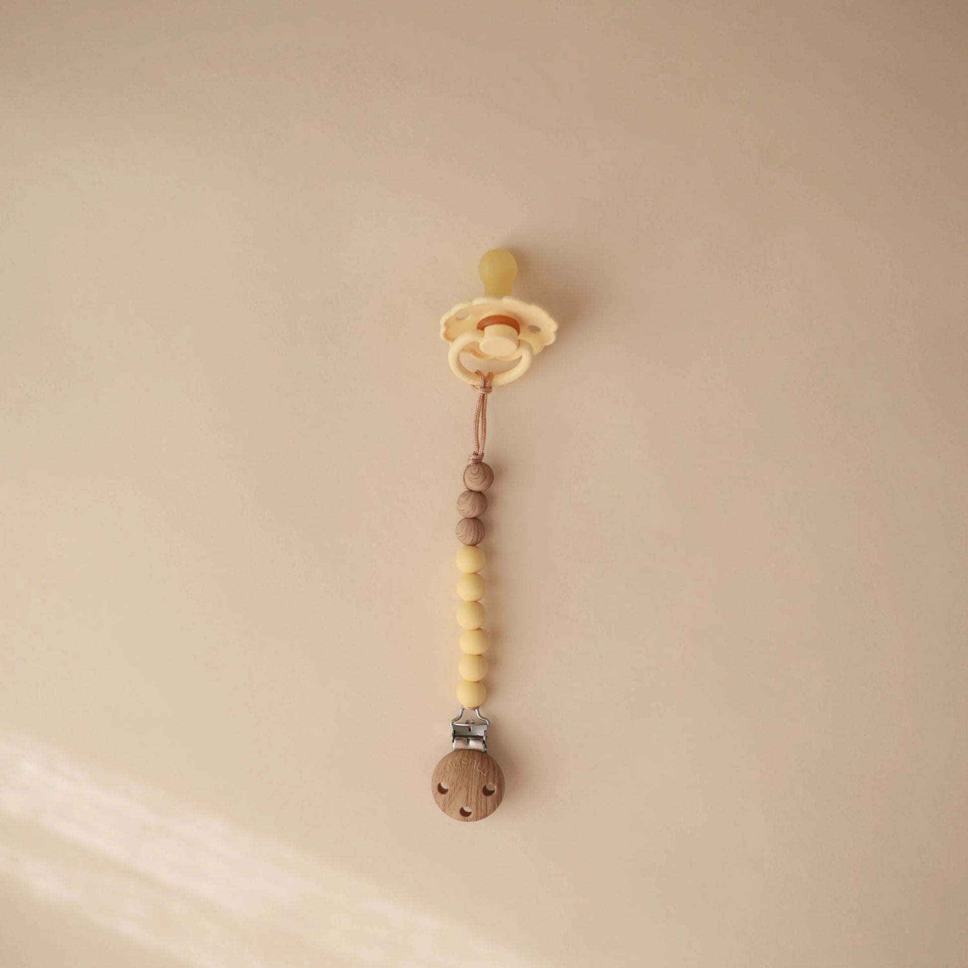 Silicone Pacifier Clip Eva with Faux Wood Clasp and Colorful Beads Mushie Everetts Place: Online Boutique