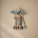 Mushie Silicone Pacifier Clip Eva with Faux Wood Clasp and Colorful Beads - Baby & Toddler > Baby Health > Pacifier Clips & Holders Pacifier Clip