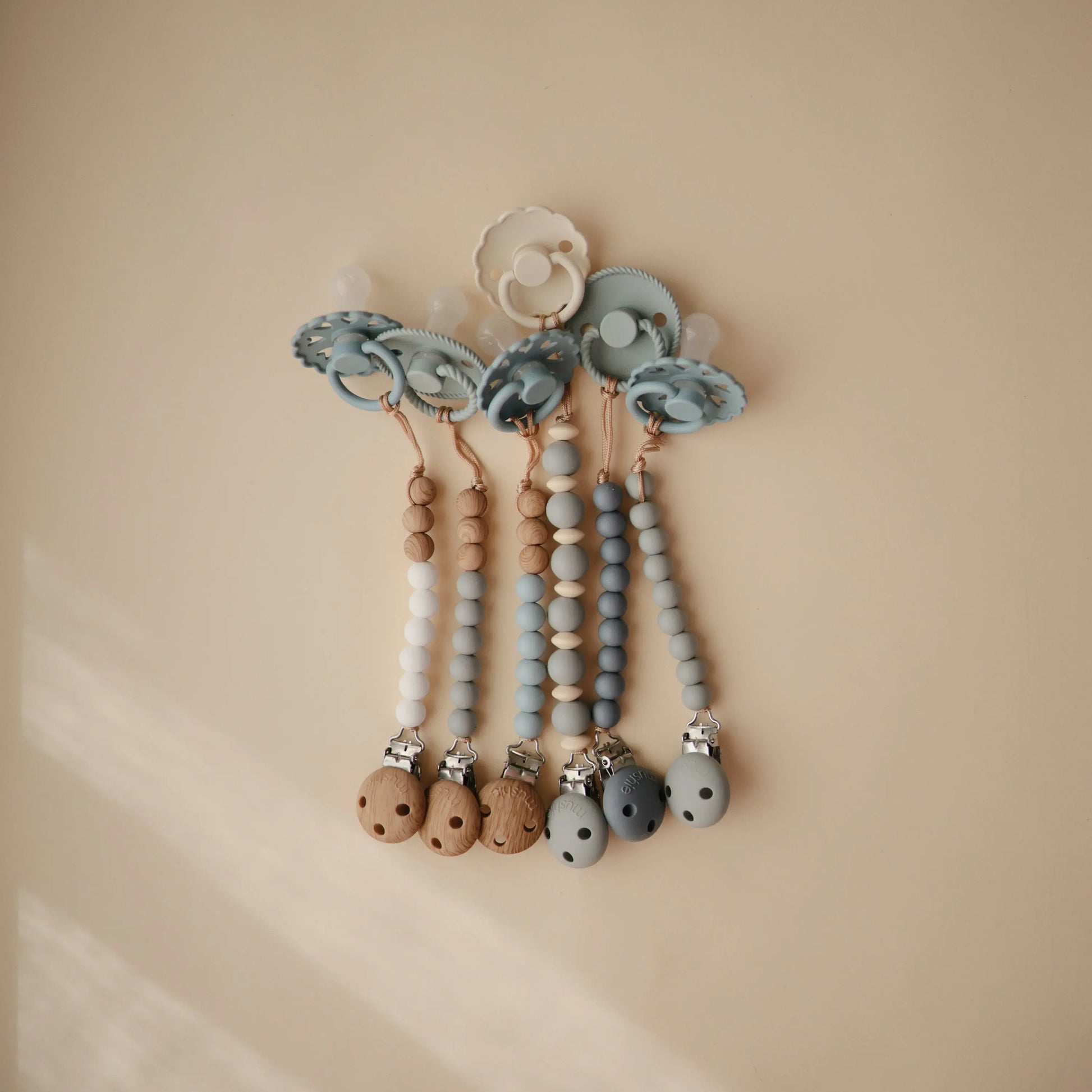 Silicone Pacifier Clip Eva with Faux Wood Clasp and Colorful Beads Mushie Everetts Place: Online Boutique