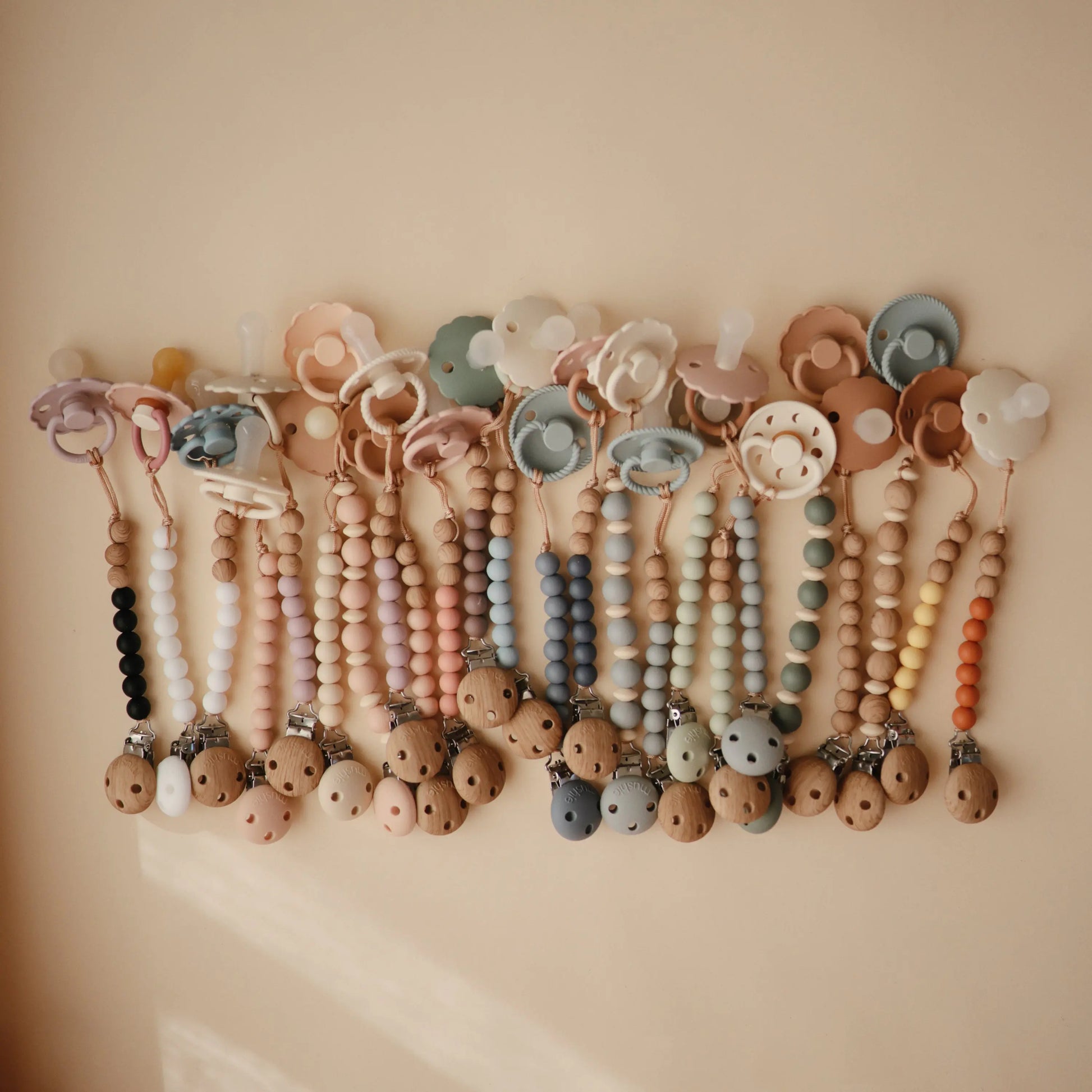 Silicone Pacifier Clip Eva with Faux Wood Clasp and Colorful Beads Mushie Everetts Place: Online Boutique