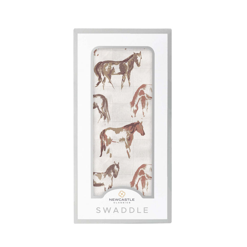 Wild Horses Bamboo Swaddle in packaging featuring horse print design.