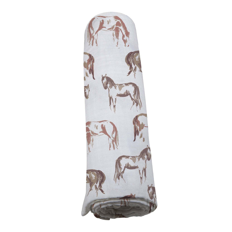 Wild Horses Bamboo Swaddle made from soft, breathable muslin with horse print design.