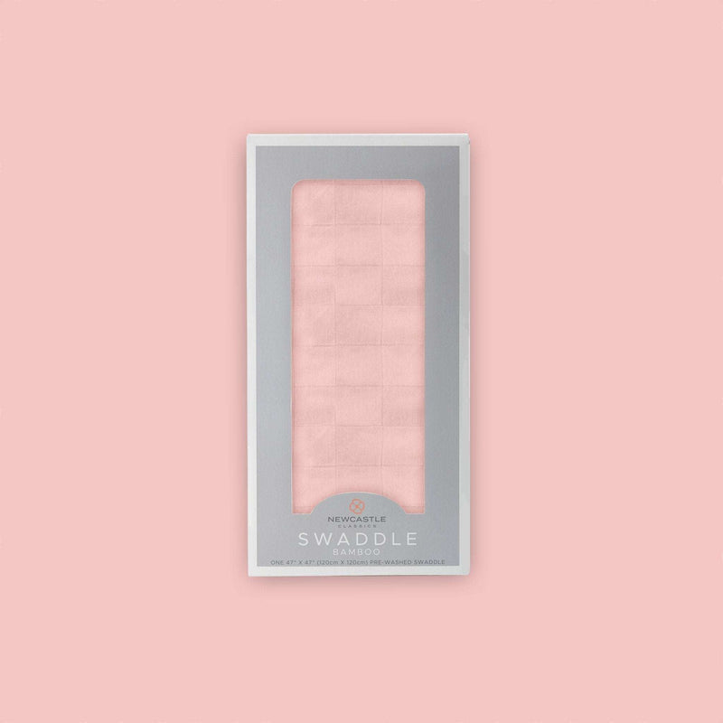 Pink Rose Bamboo Swaddle in packaging, soft muslin material, 100% bamboo fibers, 47x47 inches.