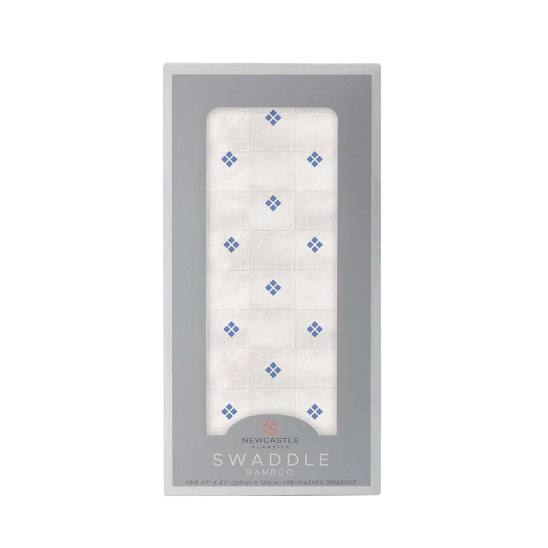 Periwinkle Diamond Polka Dot Swaddle in bamboo muslin packaging.
