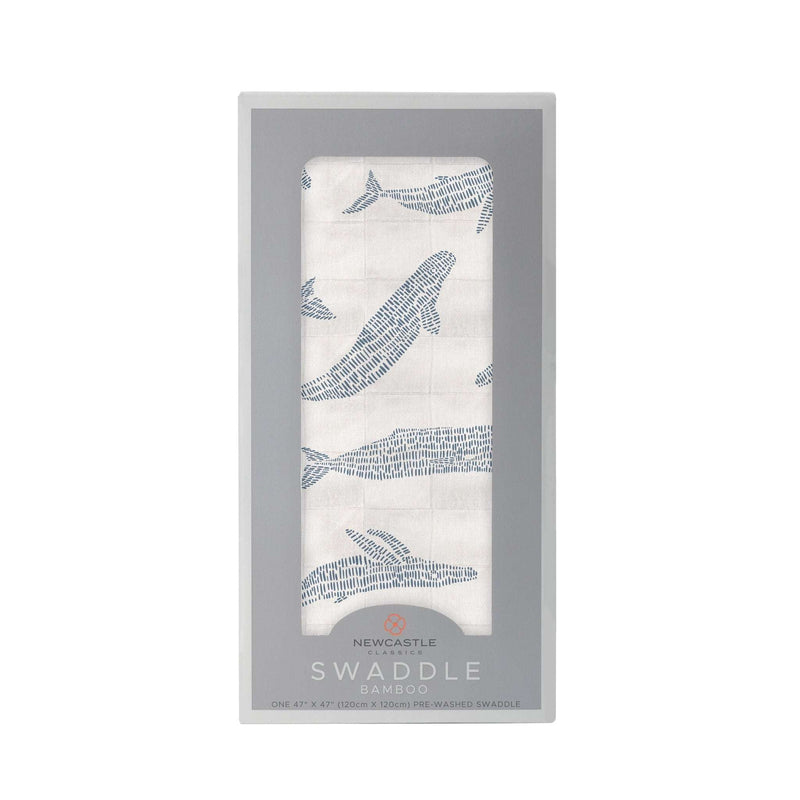 Blue Shadow Whales Bamboo Swaddle in packaging, featuring soft, breathable muslin made from natural bamboo fibers.