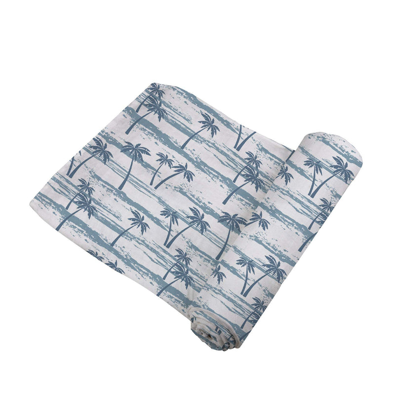 Ocean Palm Trees bamboo swaddle with blue palm tree design, 47" x 47", made from 100% natural bamboo muslin.