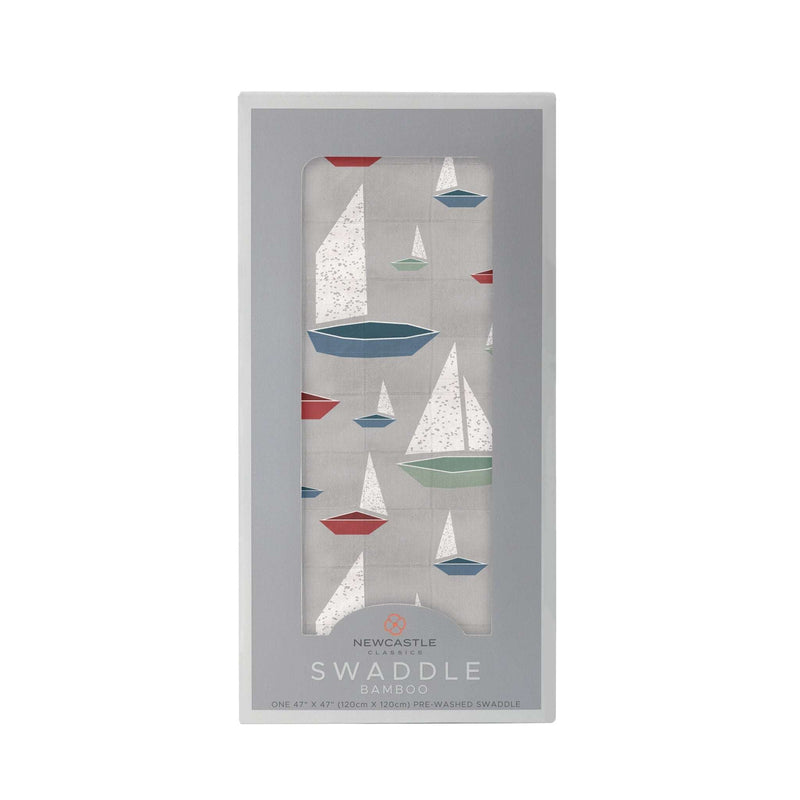 Marina Sailboats Bamboo Swaddle in packaging, featuring a soft and breathable design with sailboat print.