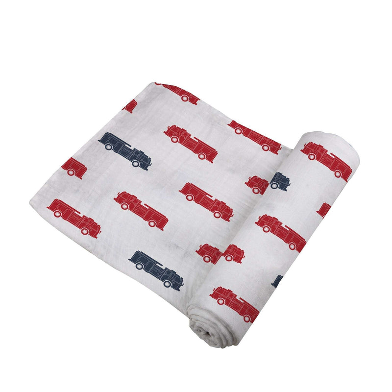 Blue and red fire trucks printed cotton muslin swaddle.