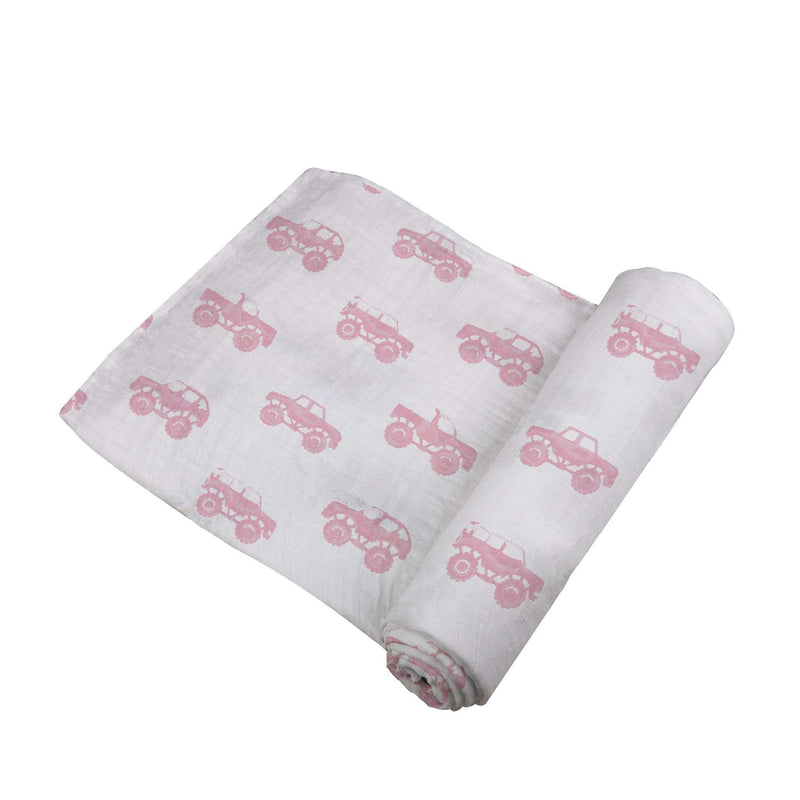 Pink Monster Trucks bamboo muslin swaddle, 47x47 inches, featuring soft breathable fabric.