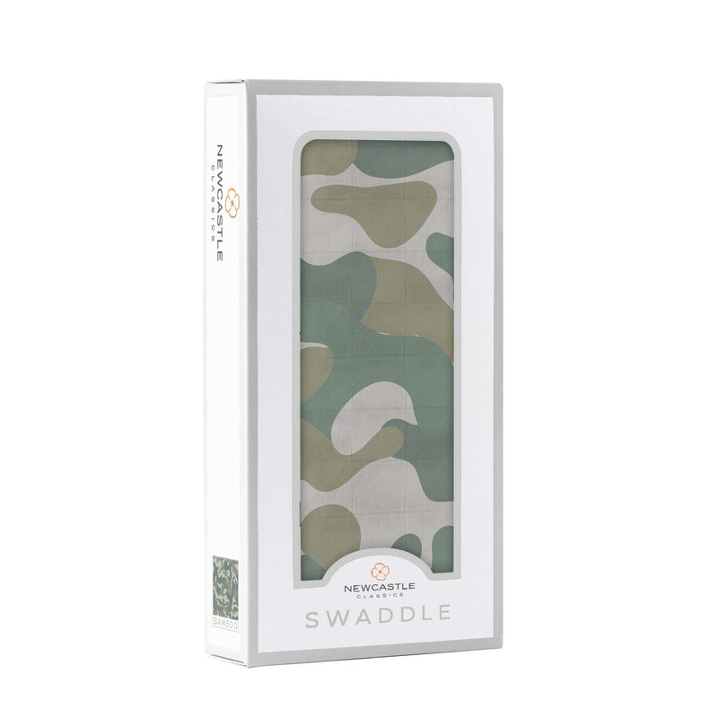 Hunter's Camo Swaddle in packaging with green camo pattern, made from 100% natural bamboo muslin.