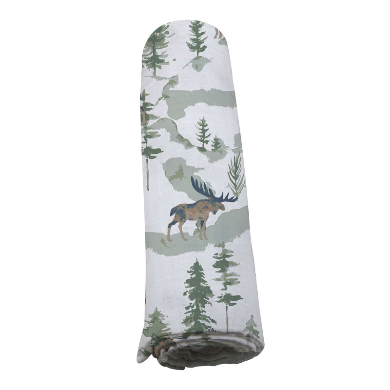 Soft Mountain Moose Swaddle made from natural bamboo muslin, rolled and featuring a moose and forest design.