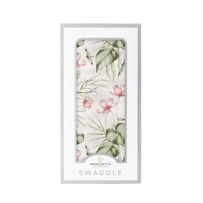 Silver Pink Orchid Swaddle in packaging with floral design, made from 100% natural bamboo muslin.