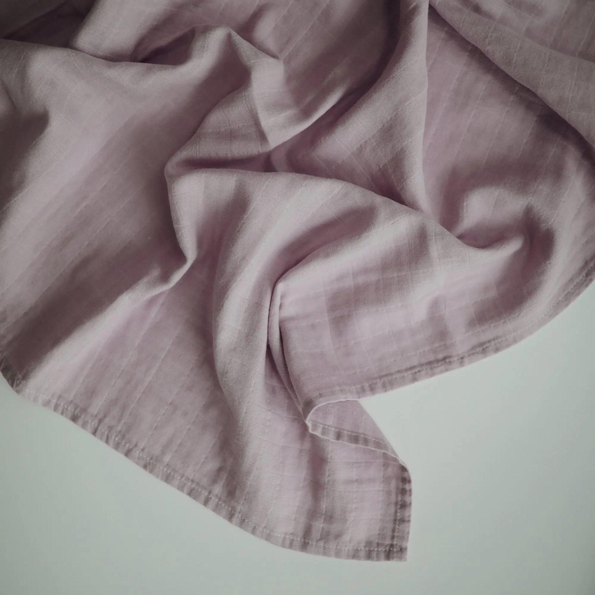 Organic Cotton Muslin Swaddle Blanket for Baby Cuddling and Nursing Mushie