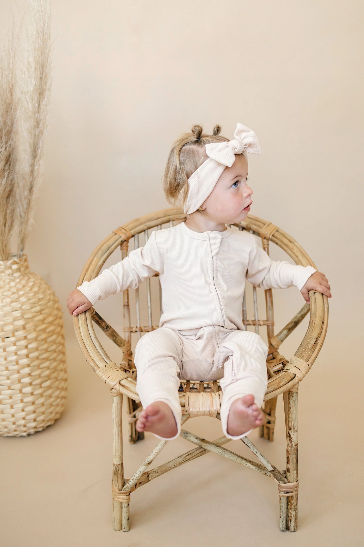 Solid Ribbed Bamboo Zippy Romper for Babies in Colors Little Joy Co. Everetts Place: Online Boutique 22.00