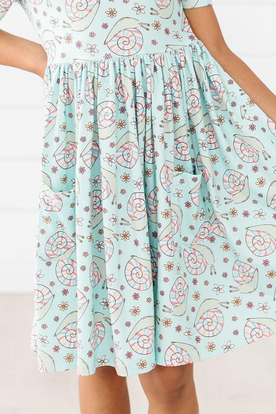 Spring Snails Short Sleeve Pocket Twirl Dress Mila Rose Mila & Rose ® Everetts Place: Online Boutique