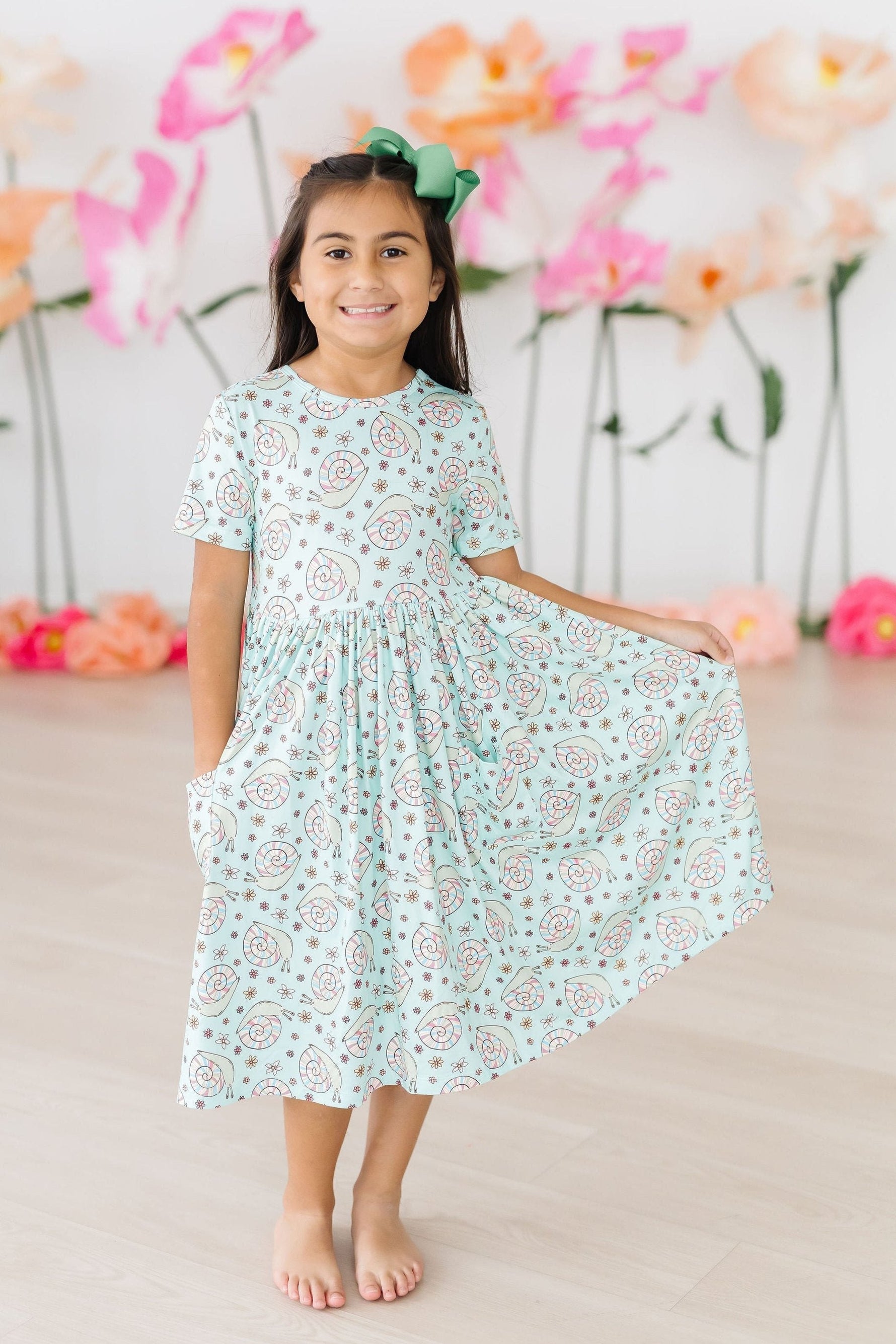 Spring Snails Short Sleeve Pocket Twirl Dress Mila Rose Mila & Rose ® Everetts Place: Online Boutique