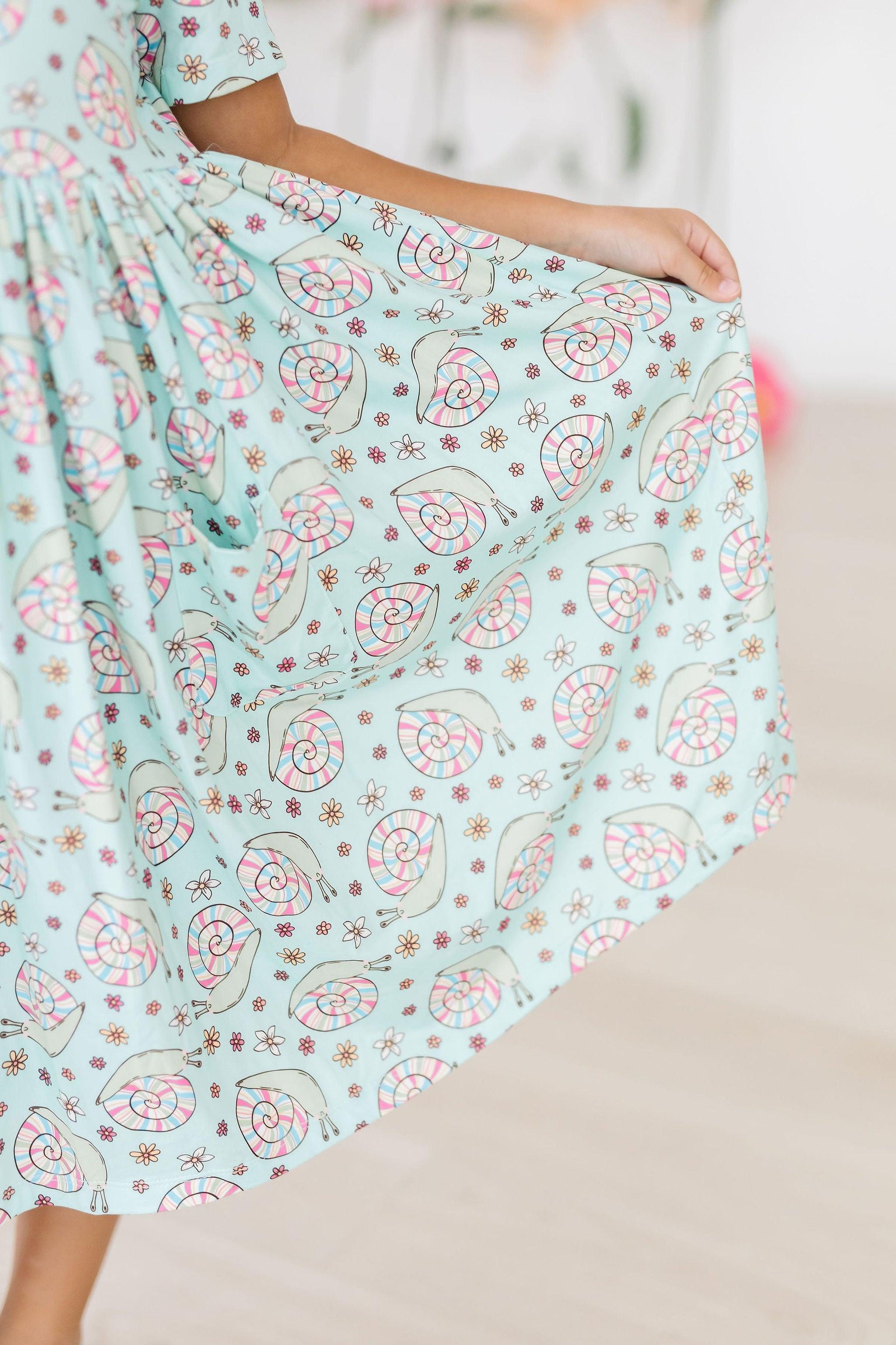 Spring Snails Short Sleeve Pocket Twirl Dress Mila Rose Mila & Rose ® Everetts Place: Online Boutique