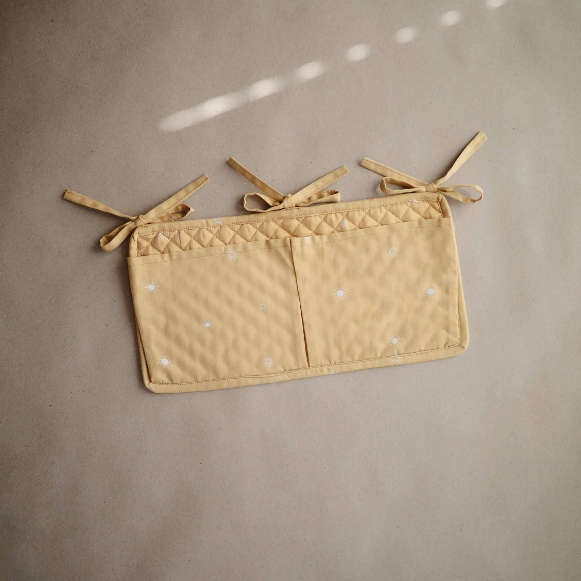 Storage Pocket for Baby Essentials with Adjustable Ribbon Ties Mushie Everetts Place: Online Boutique
