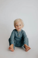 Three Little Tots Storm Blue Baby Ribbed Playsuit with pockets - 