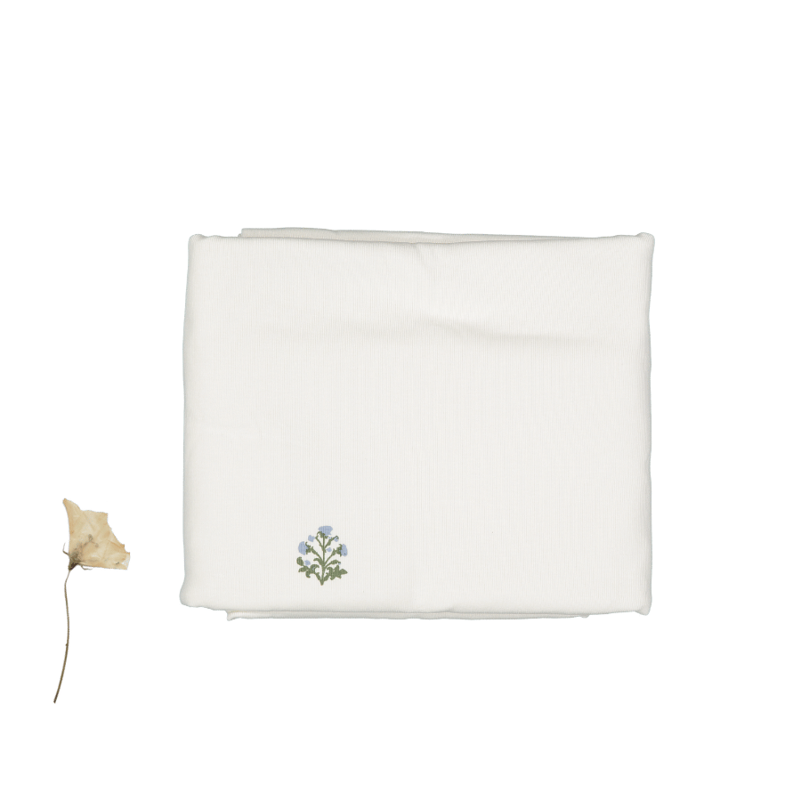 Square baby blanket in blue Zara embroidered-look print, spread flat to show the allover stitched-style design