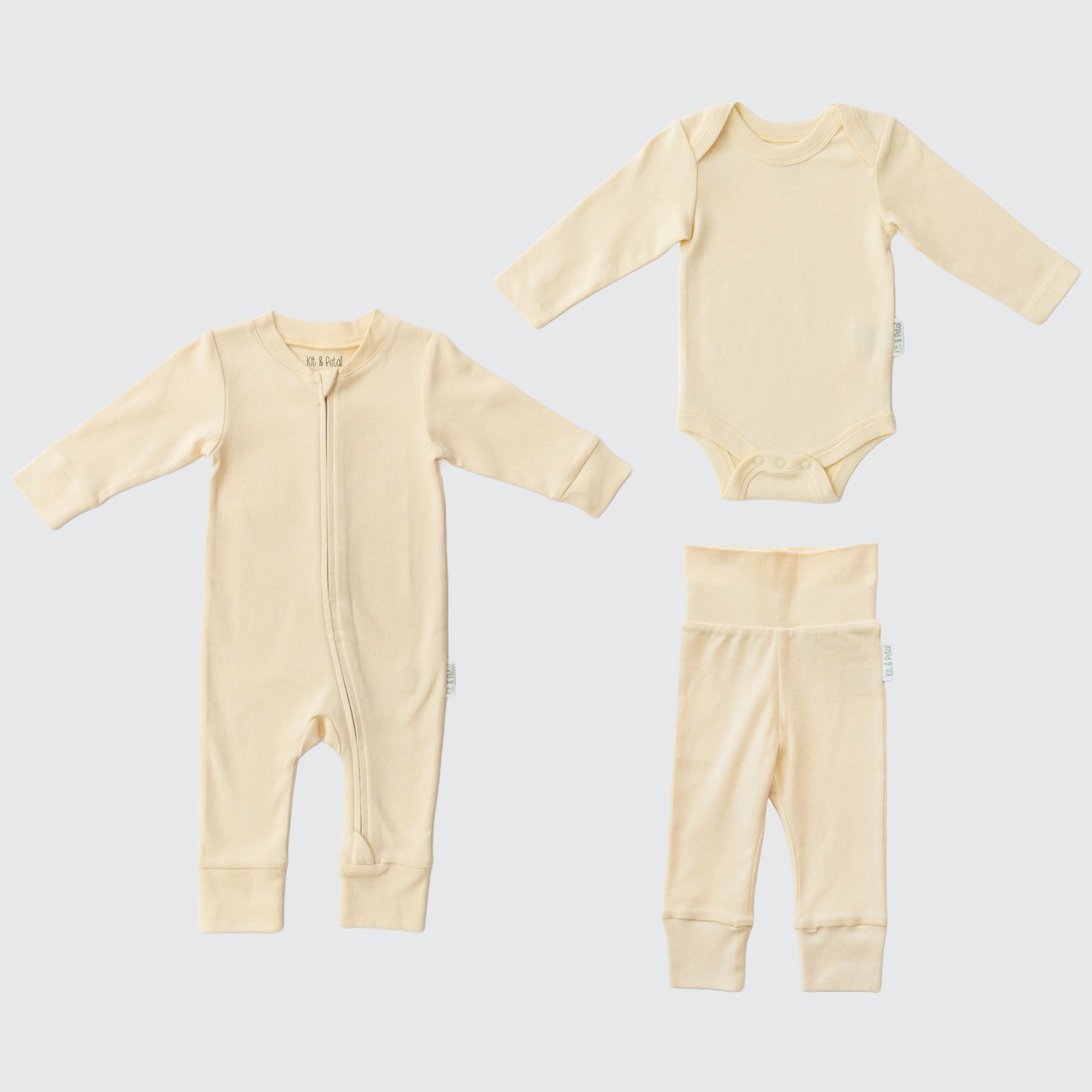 Three-piece baby outfit set in sunny yellow with long sleeve romper, bodysuit, and fold-over pants