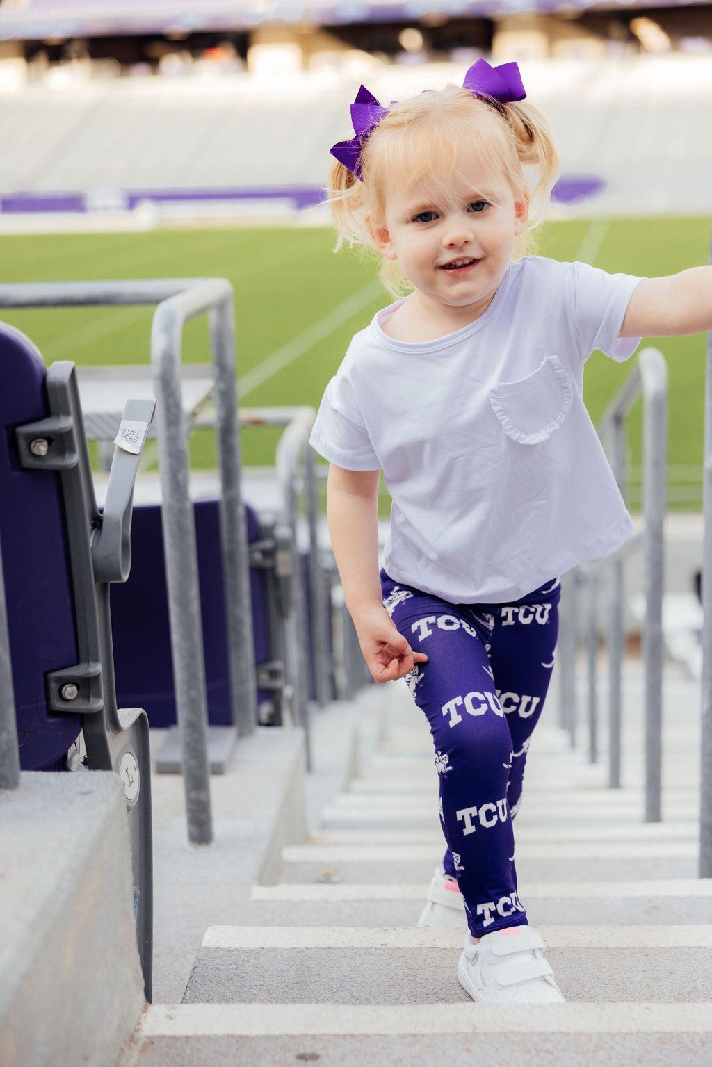 Mila & Rose organic baby leggings with purple horned frog print.
