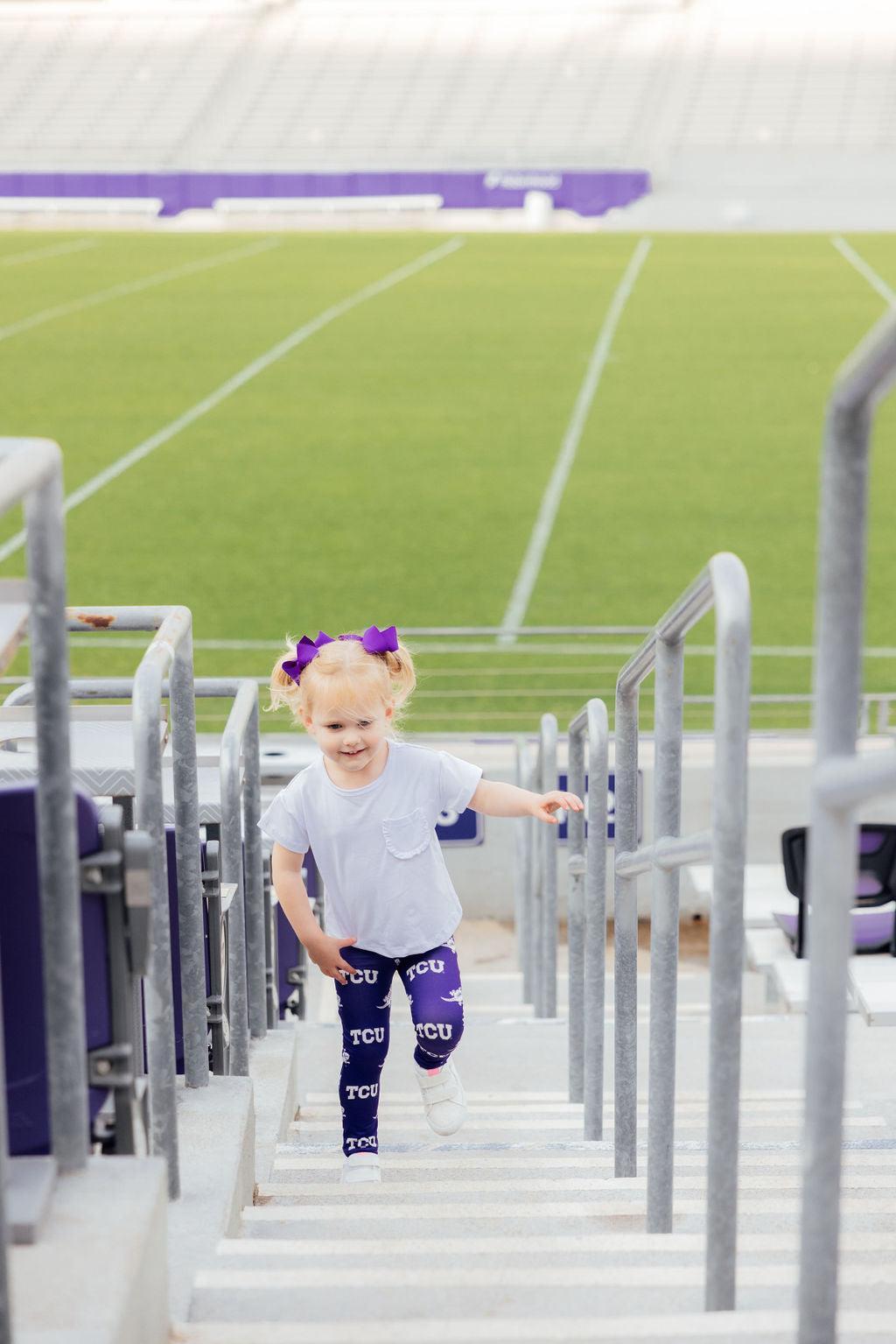 Mila & Rose TCU purple frog print organic baby leggings.