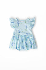 Short-sleeve flutter twirl bodysuit with a Texas bluebonnet floral print and a twirl skirt hem.