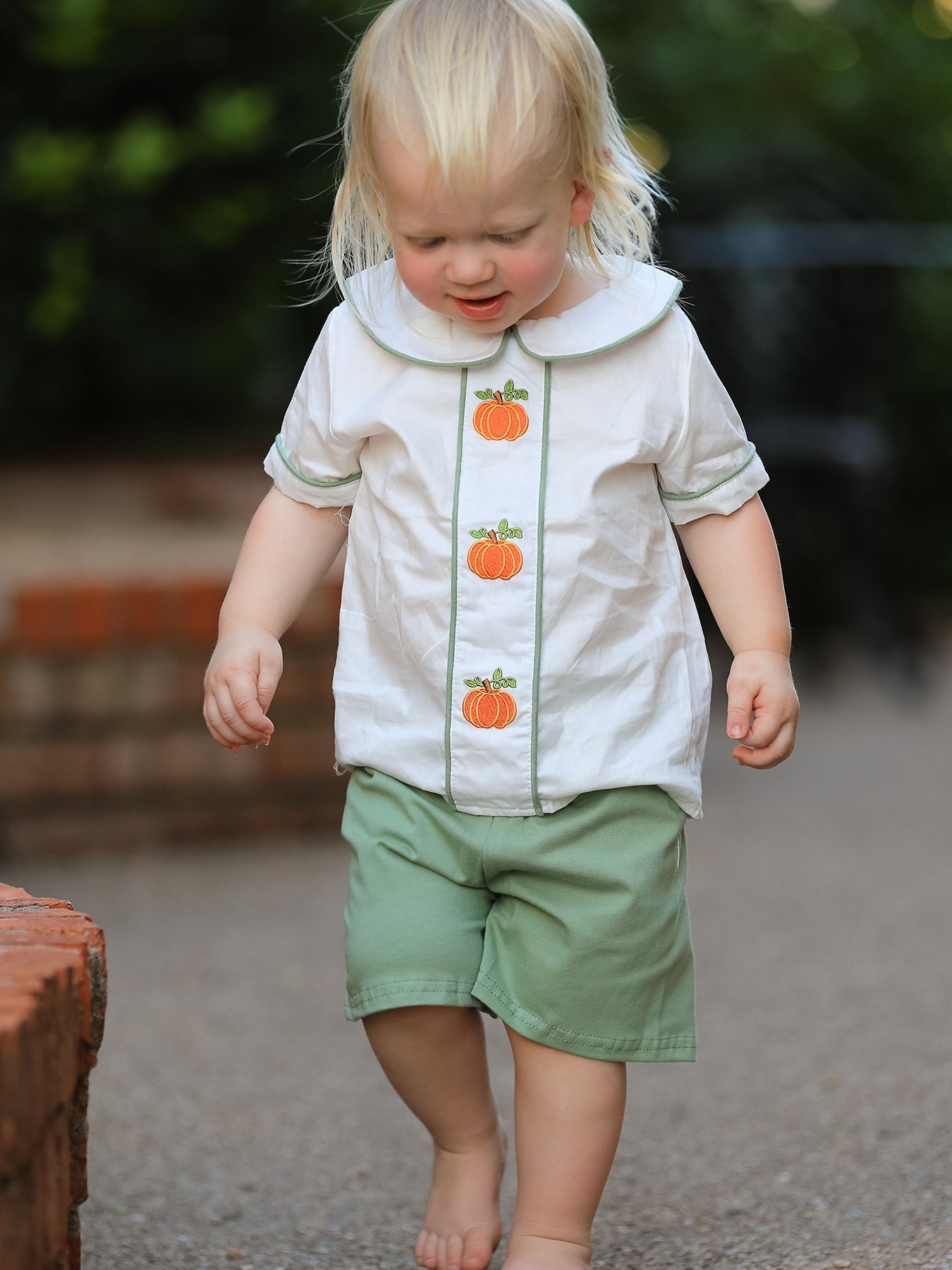 Boy's two-piece cotton set with pumpkin appliques for fall and Halloween.