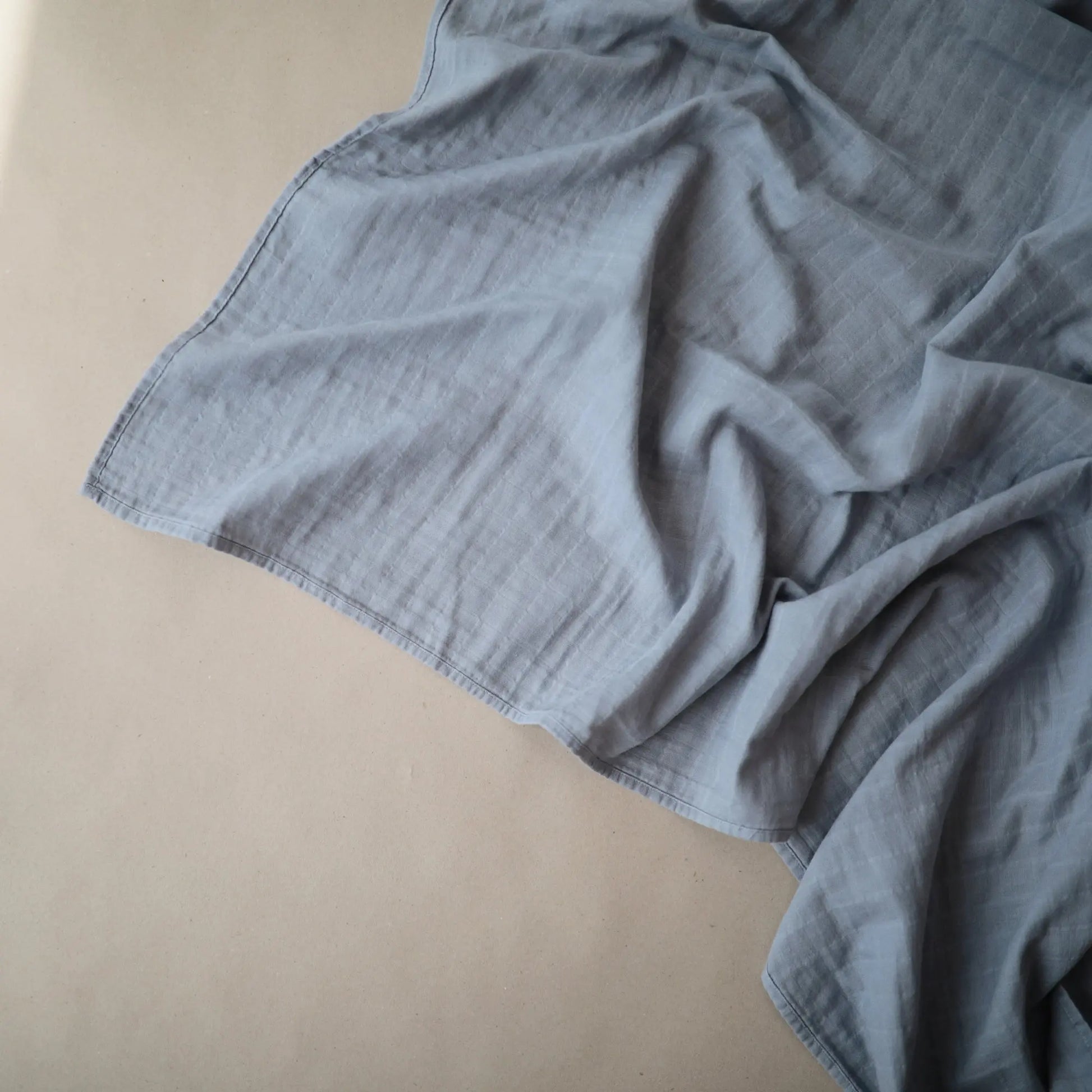 Organic Cotton Muslin Swaddle Blanket for Baby Cuddling and Nursing Mushie