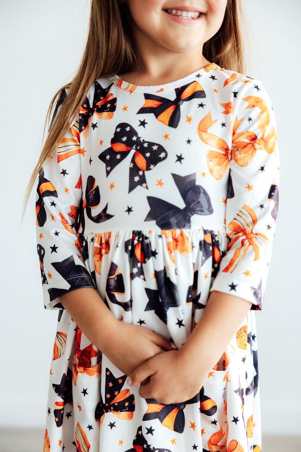 Trick or Twirl 3/4 sleeve twirl dress with pockets in a Halloween-themed print