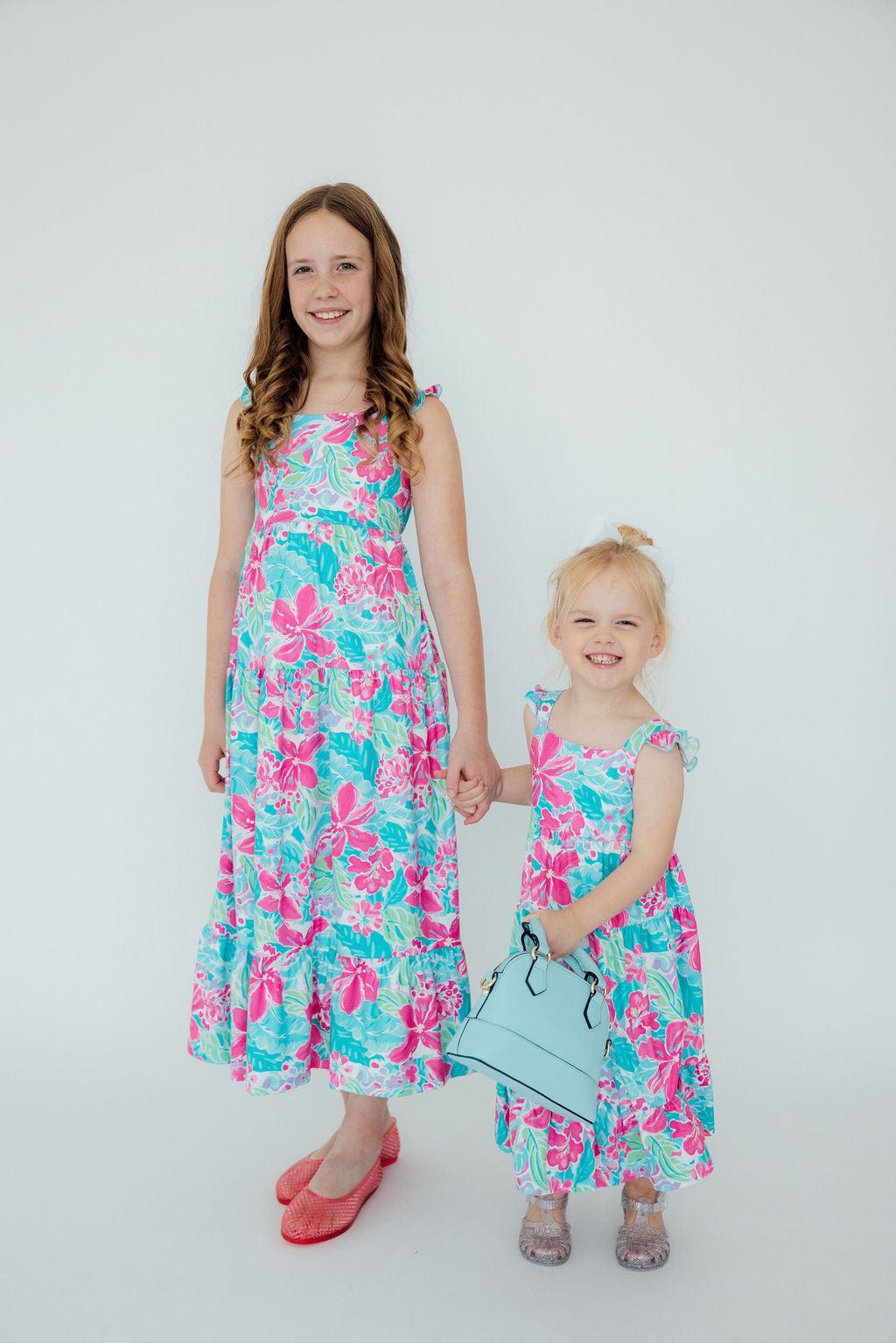 Tropical punch print ruffle maxi dress with ruffled shoulder straps and a back cutout