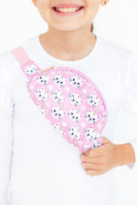Belt bag with a unicorn kitty print and adjustable strap for wearing at the waist or cross body
