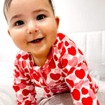 Norani Baby organic footie pajamas, red and pink hearts.