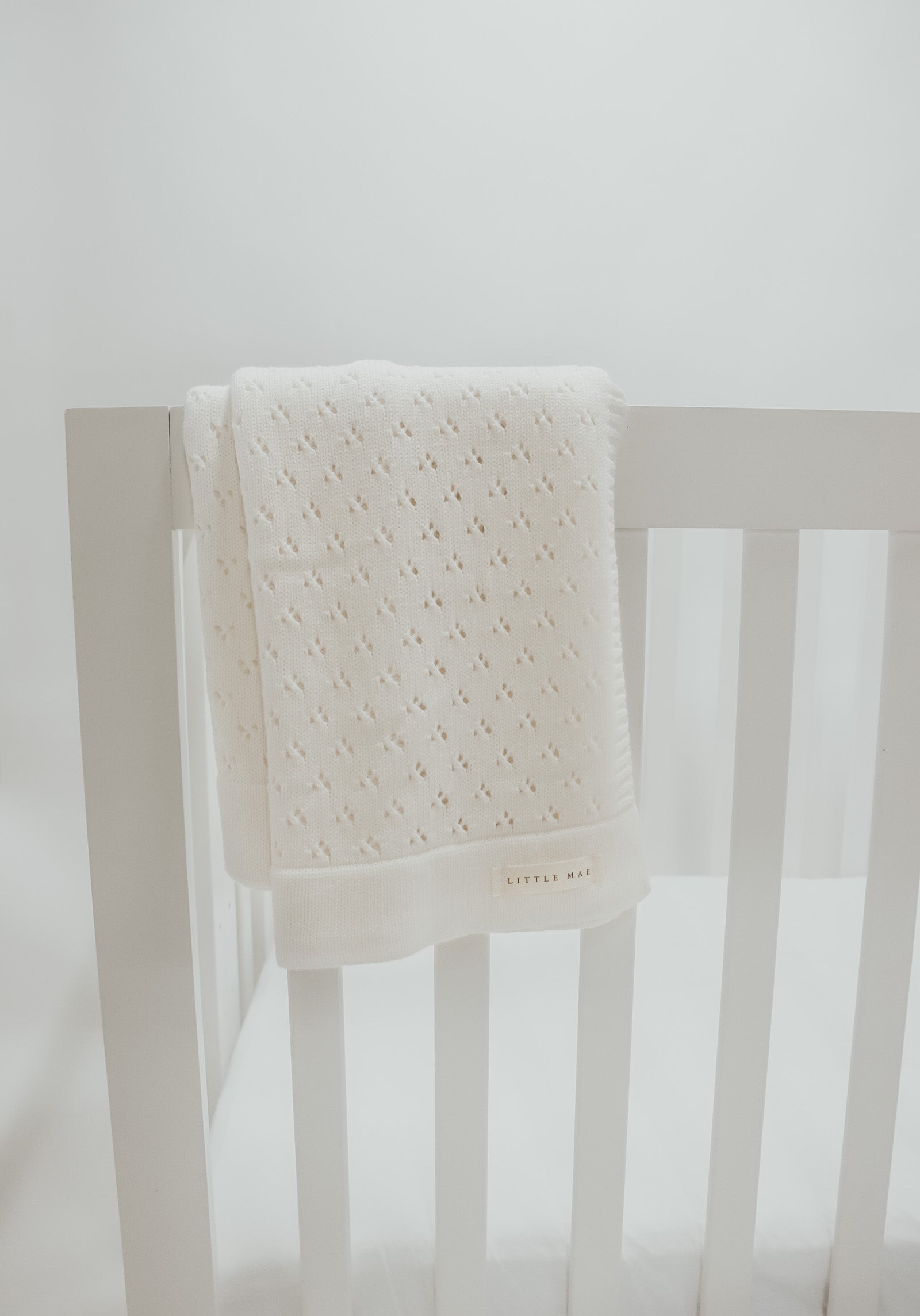 Vanilla Pointelle Knit Baby Blanket By Little Mae And Co Little Mae & Co Everetts Place: Online Boutique