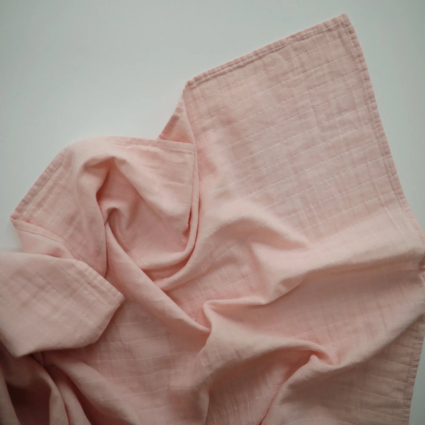 Organic Cotton Muslin Swaddle Blanket for Baby Cuddling and Nursing Mushie