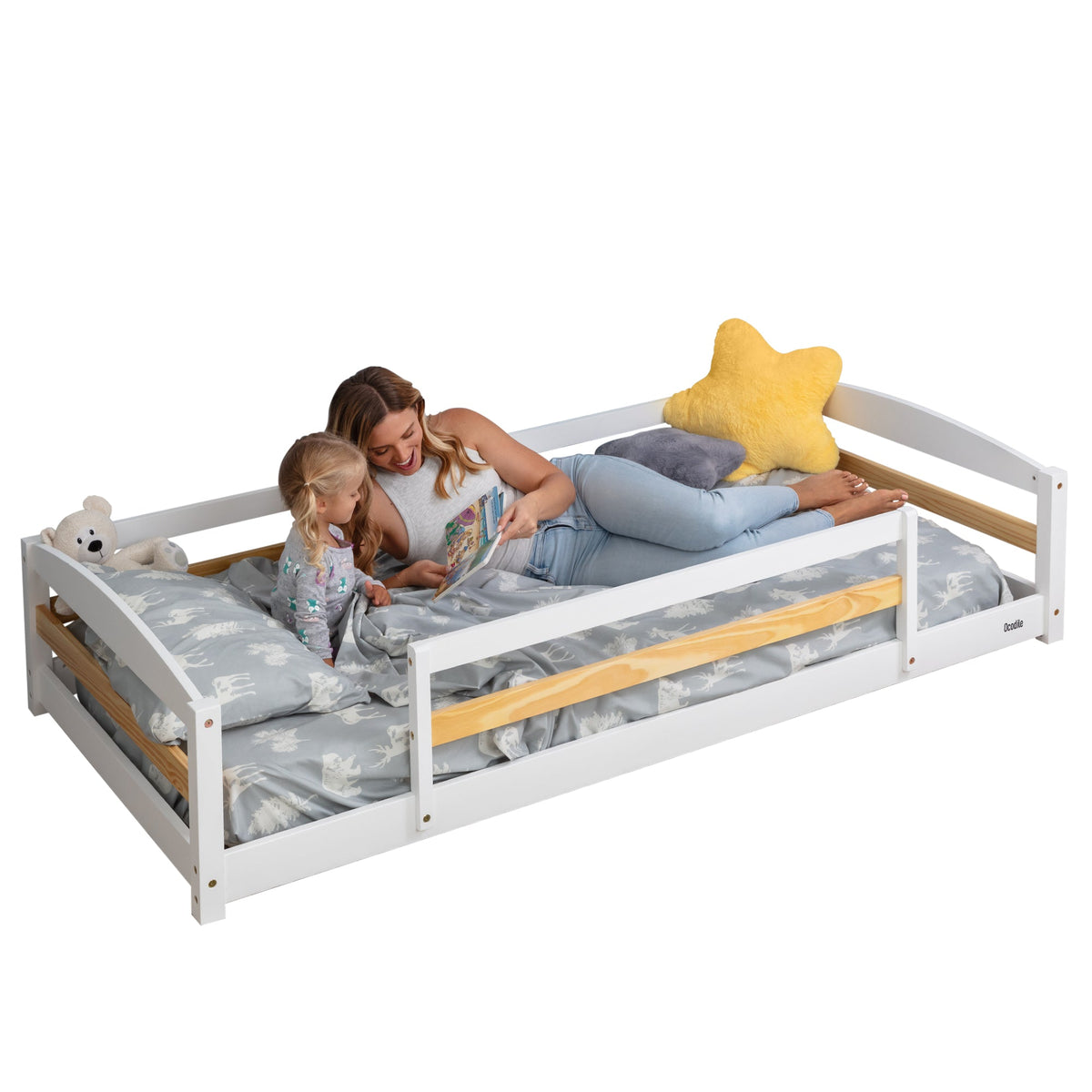Twin-size Montessori floor bed with slatted base, low frame, full guardrails, and rounded corner posts