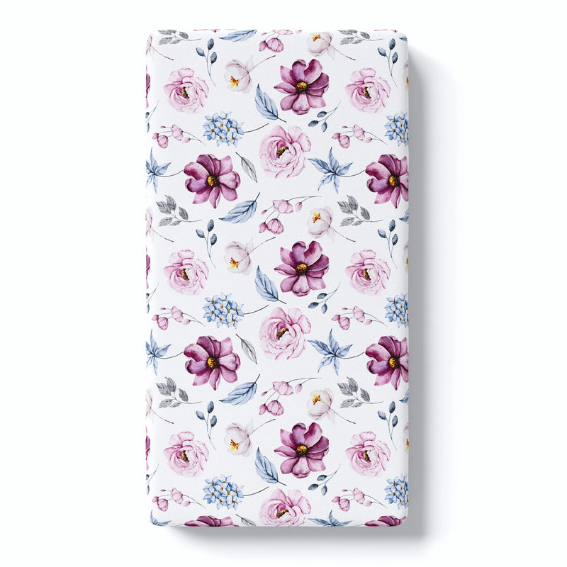 Vintage floral fitted crib sheet with pink and purple flowers, soft rayon fabric.
