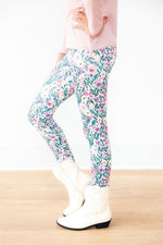 Mila & Rose Vivid Garden organic baby leggings, vibrant floral print.