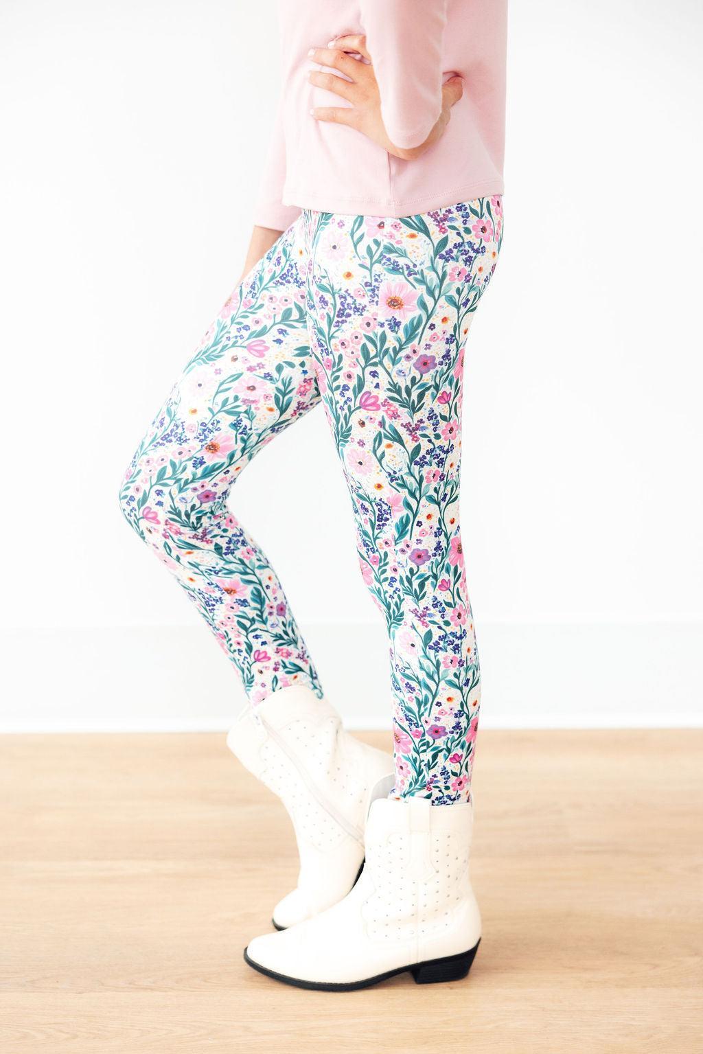 Mila & Rose Vivid Garden organic baby leggings, vibrant floral print.