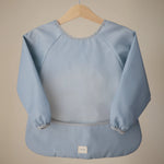 Mushie Water Resistant Long Sleeve Bib for Kids with Wide Pocket and Velcro Closure - Baby & Toddler > Nursing & Feeding > Bibs Long Sleeve Bib