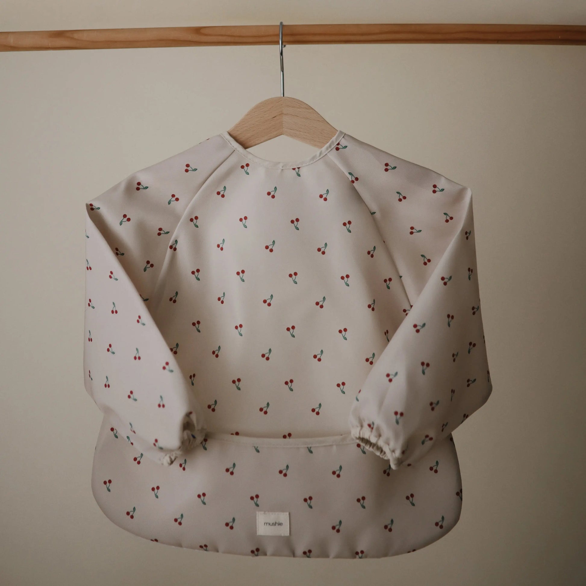 Water Resistant Long Sleeve Bib for Kids with Wide Pocket and Velcro Closure Mushie Everetts Place: Online Boutique