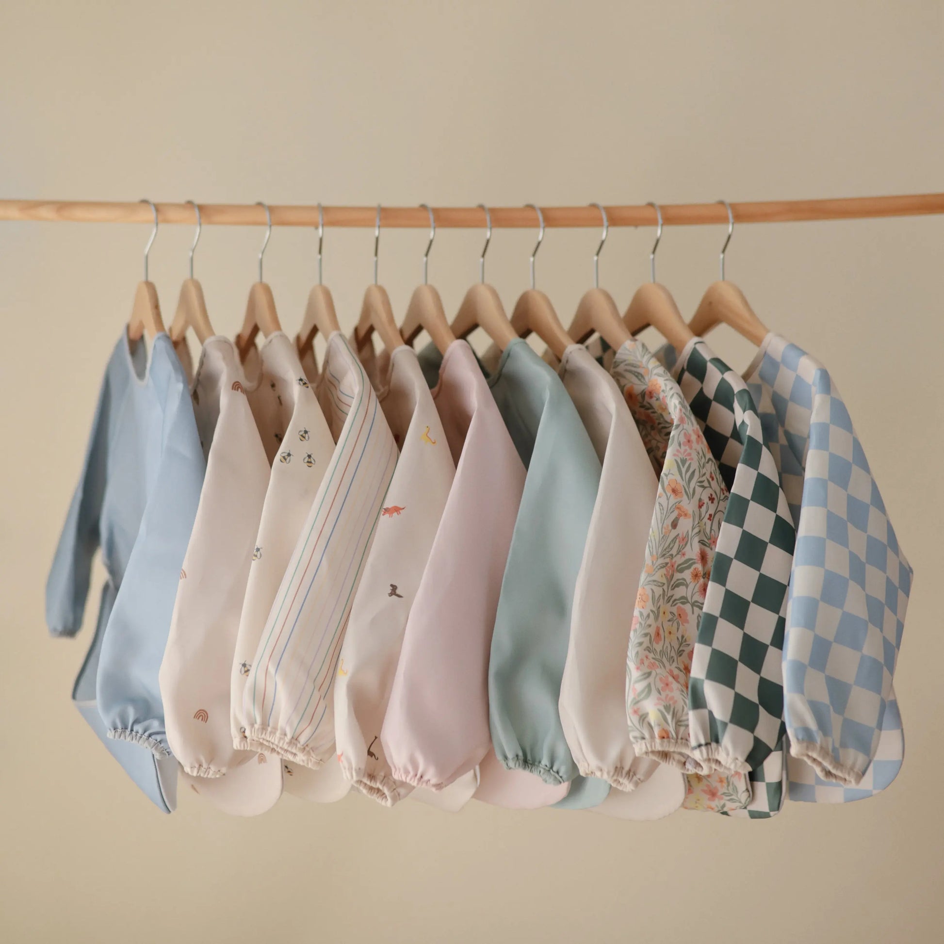 Water Resistant Long Sleeve Bib for Kids with Wide Pocket and Velcro Closure Mushie Everetts Place: Online Boutique