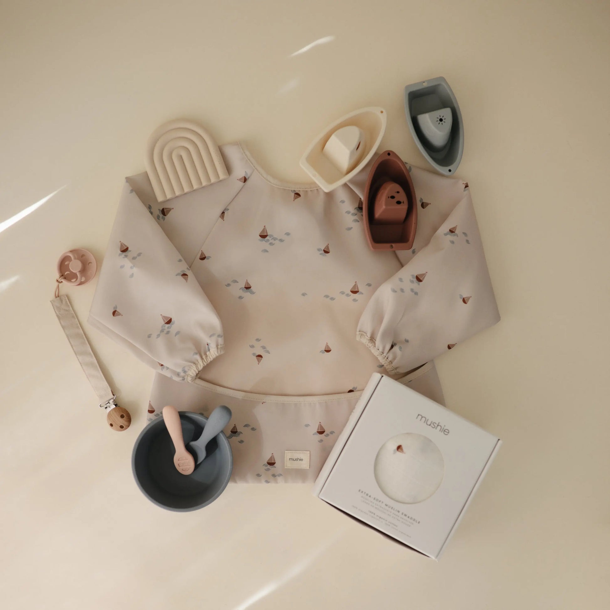 Water Resistant Long Sleeve Bib for Kids with Wide Pocket and Velcro Closure Mushie Everetts Place: Online Boutique
