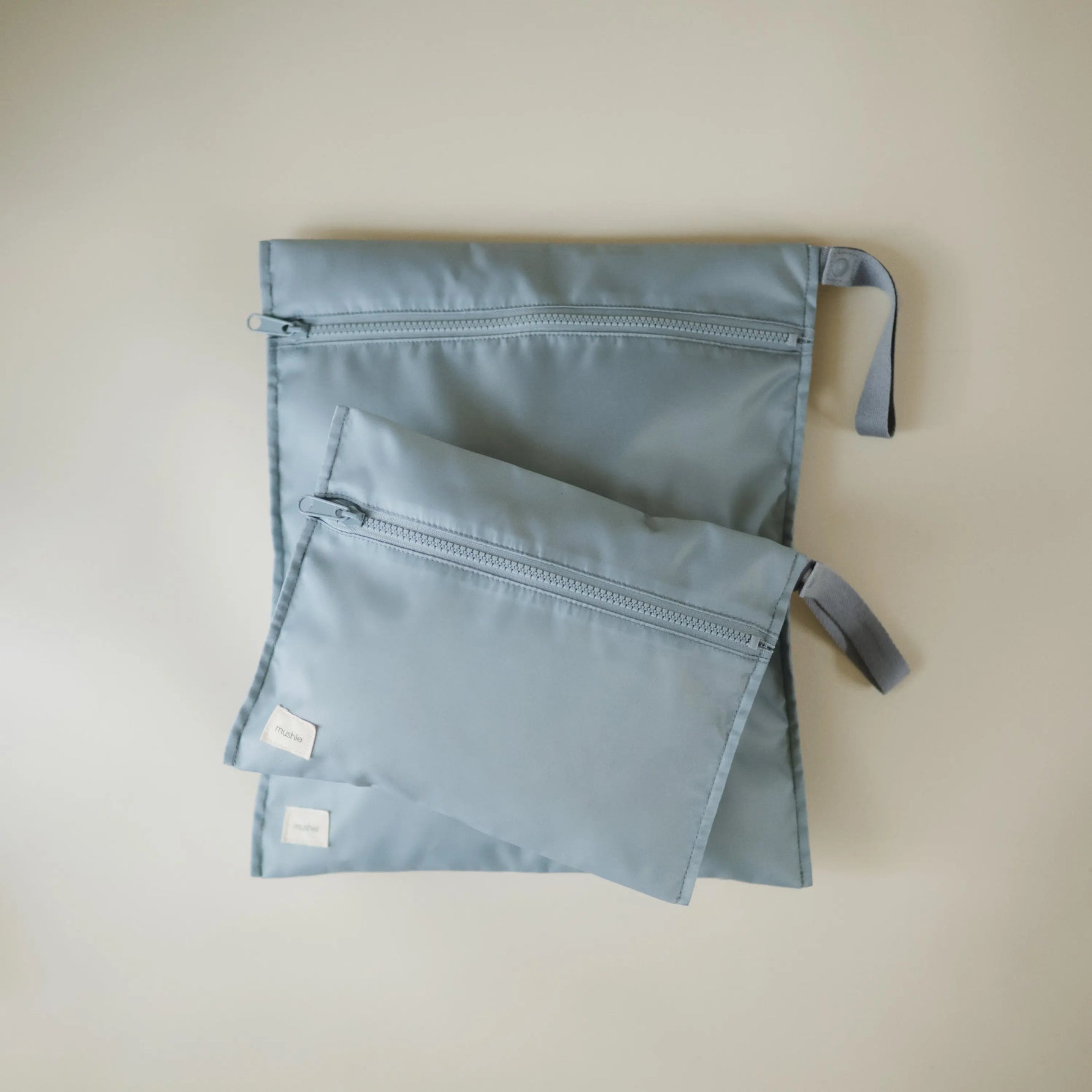 Mushie Water Resistant Wet Bag for Swimsuits and Dirty Clothes with Zipper Closure and Machine Washable Material - Baby & Toddler > Diapering > Diaper Wet Bags Wet Bag