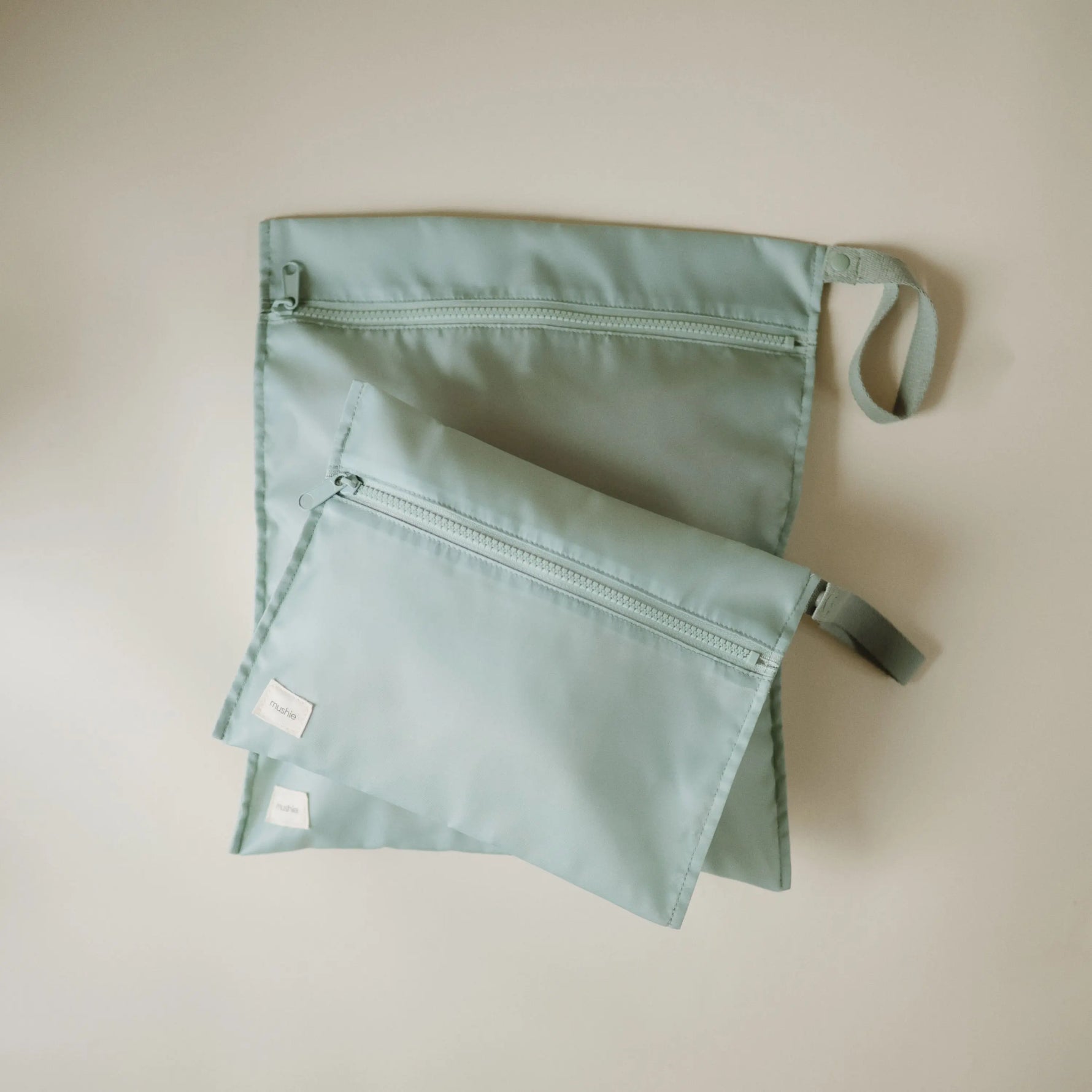 Mushie Water Resistant Wet Bag for Swimsuits and Dirty Clothes with Zipper Closure and Machine Washable Material - Baby & Toddler > Diapering > Diaper Wet Bags Wet Bag